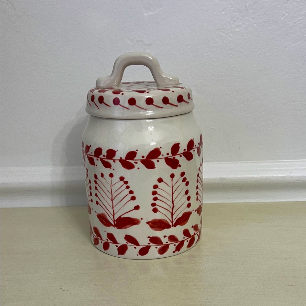 Handcrafted temptation Ceramic Jar with Red Leaf Design